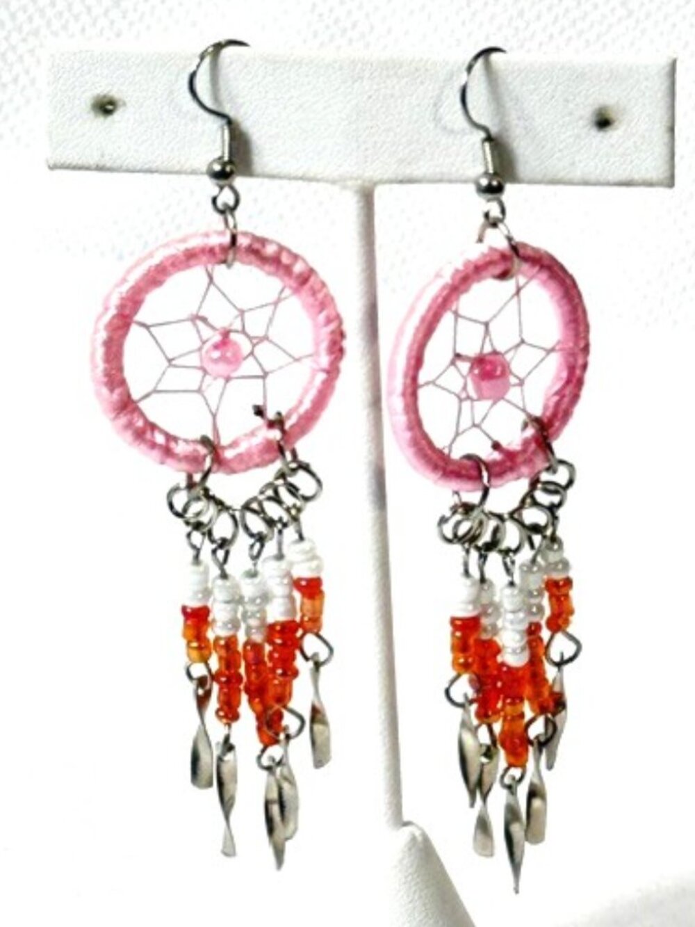 Pink dream catcher dangle earrings.